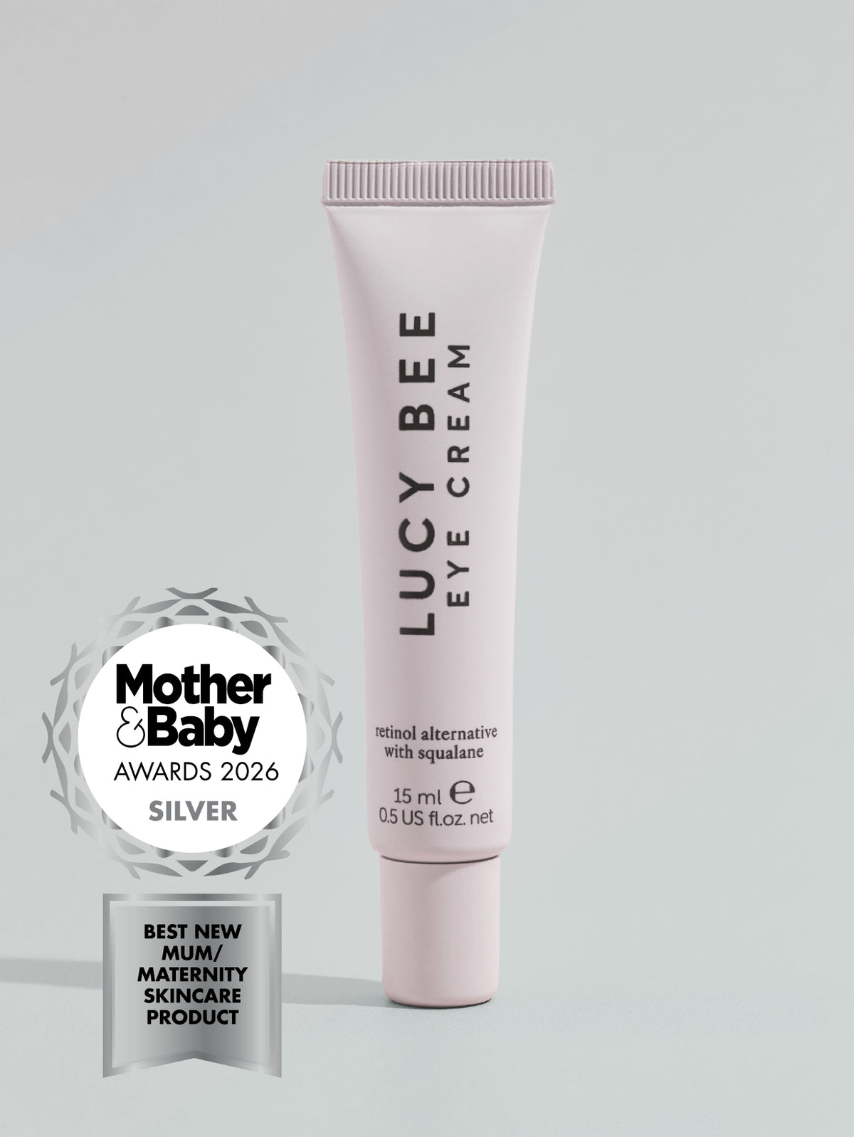 Lucy Bee eye cream with Mother & Baby Awards 2026 silver badge on a light gray background