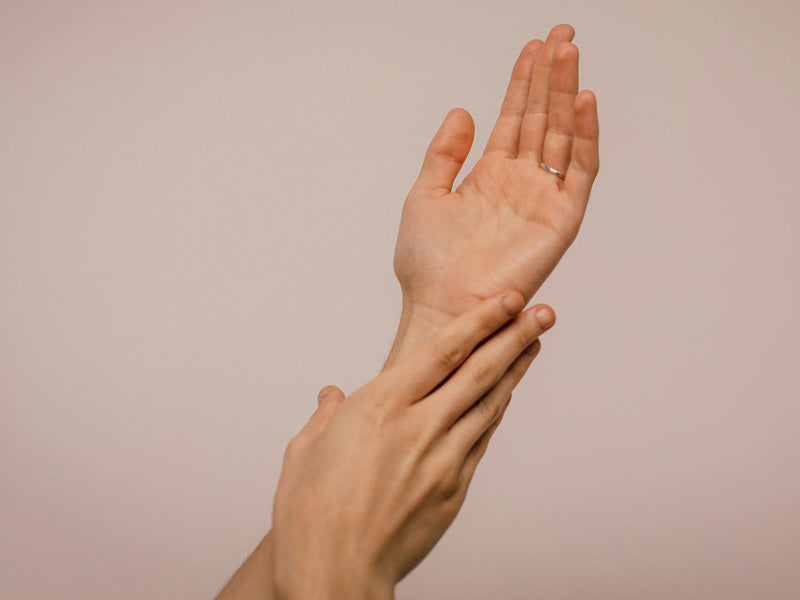 Close-up of hands showing healthy-looking skin and nails