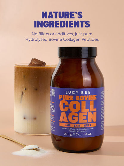 Bottle of Lucy Bee Pure Bovine Collagen with a cup of coffee and collagen powder on a beige background