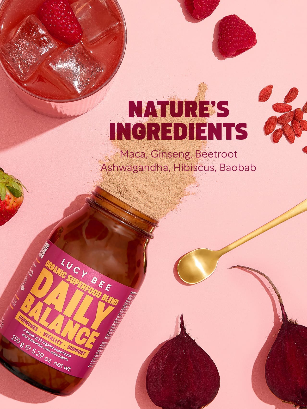 Lucy Bee Daily Balance superfood blend bottle with ingredients on a pink background. Lucy Bee organic daily balance to support stress and times when you may feel out of balance