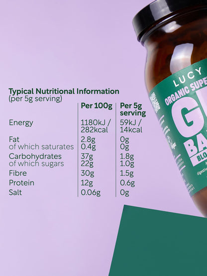 Nutritional information label on a green background with a jar of Lucy Organic Superfood Gut. lucy bee organic gut balance for digestive support with prebiotics, probiotic and digestive enzymesBlend