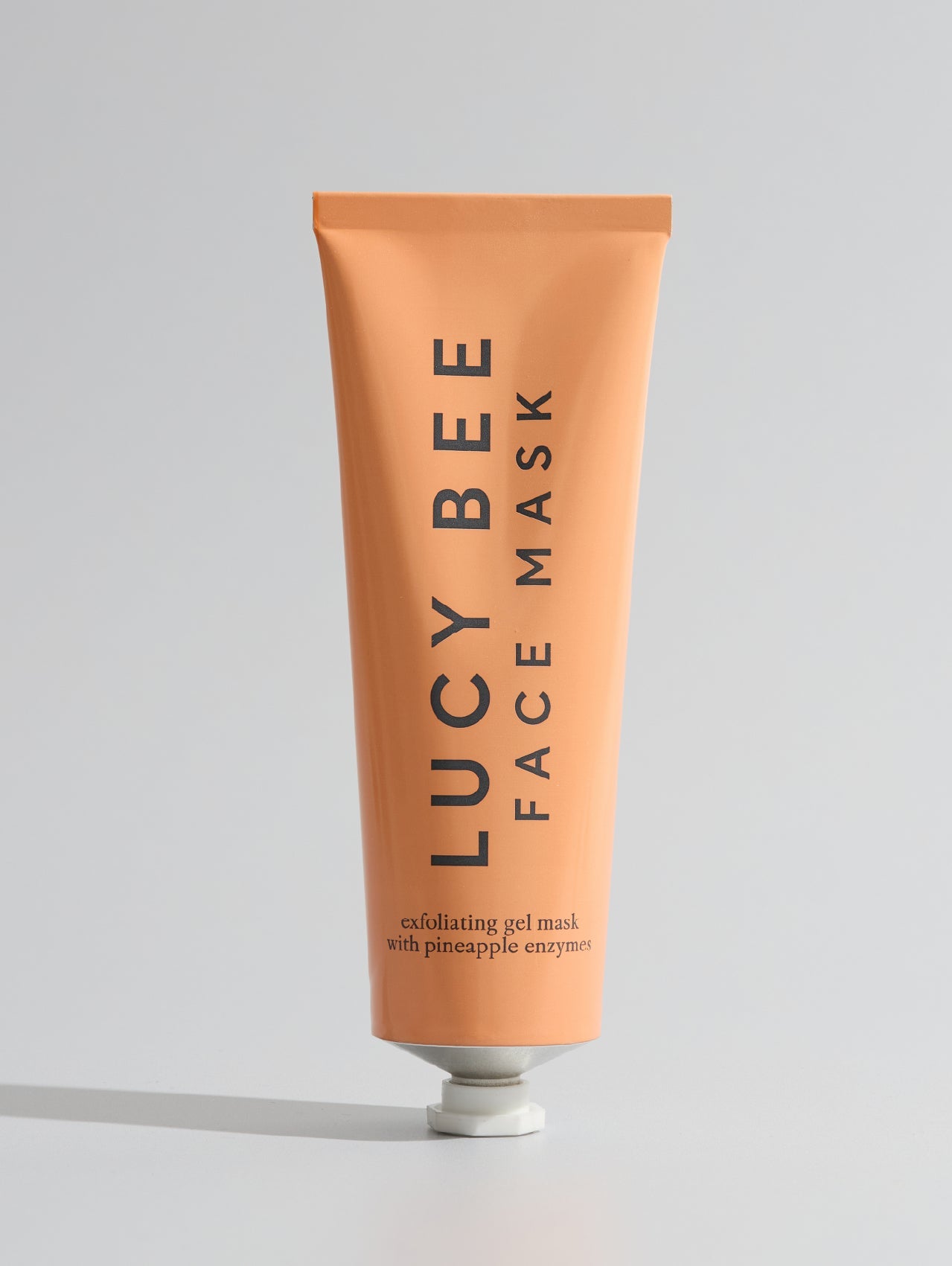 Tube of Lucy Bee face mask on a light gray background