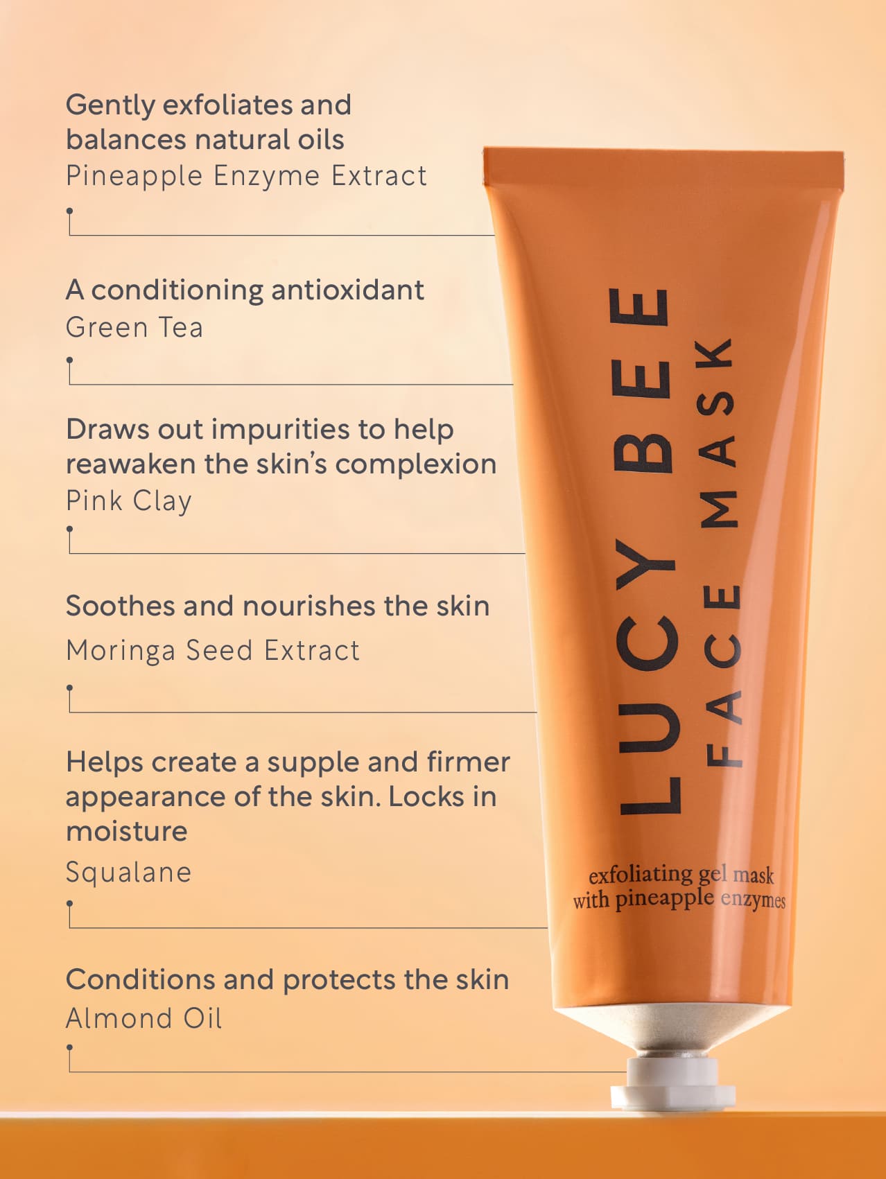 Lucy Bee face mask tube with product benefits on an orange background