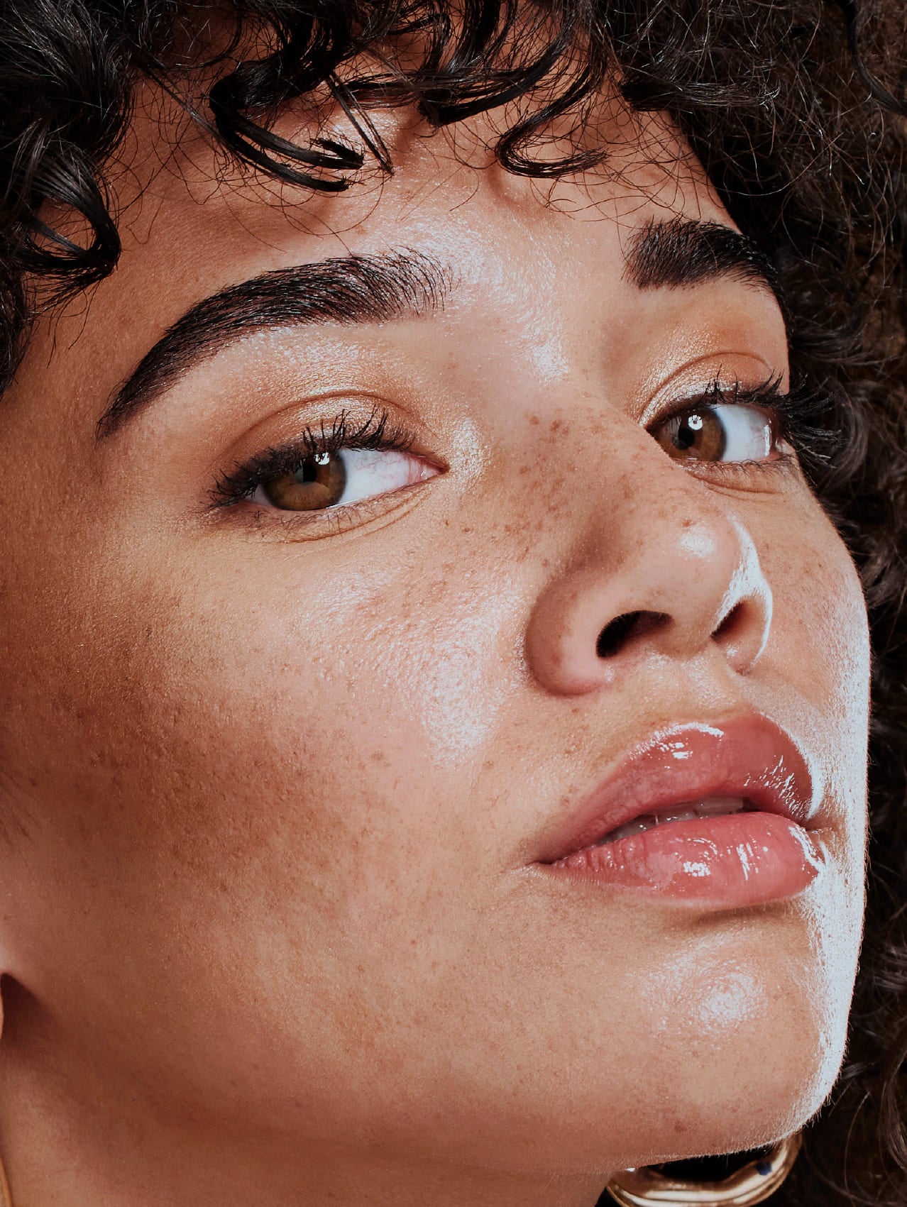 Close-up of a person's face with a soft focus on the skin texture.