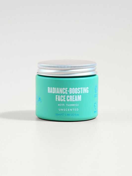 Radiance-boosting face cream jar with turquoise lid on a white background