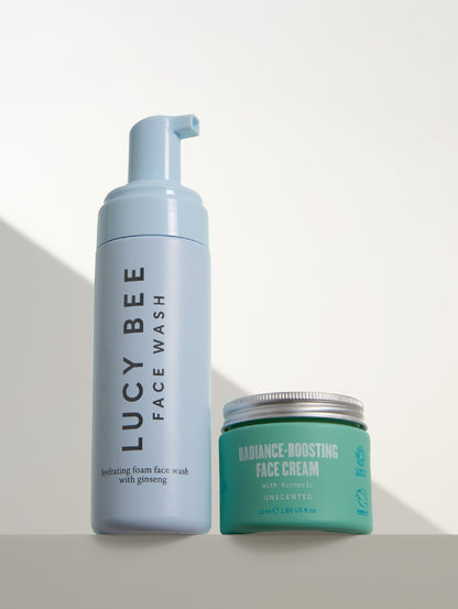 Lucy Bee natural face wash and natural face cream on a light background