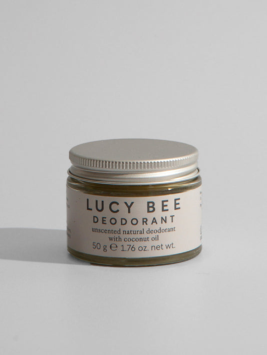 Lucy Bee deodorant jar on a light gray background