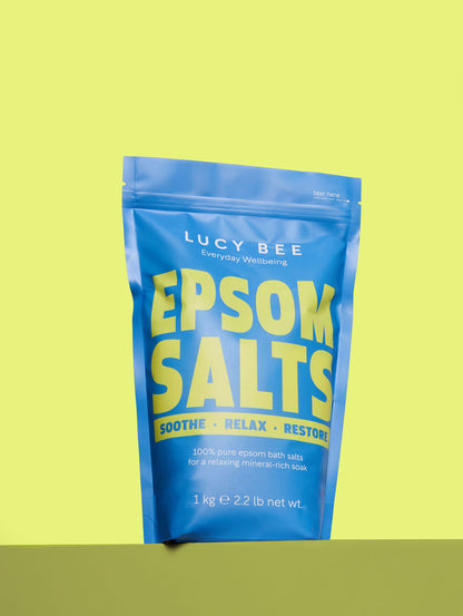 Lucy Bee Epsom Salt packet on a yellow background rich in magnesium 