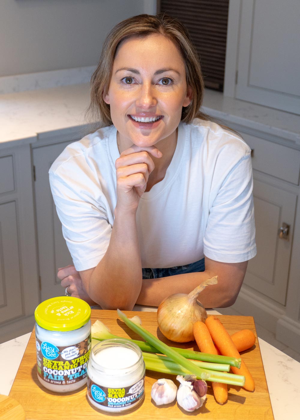 Lucy with the coconut oil that began the family business